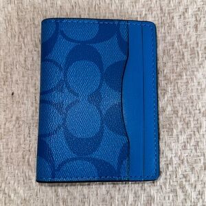 Coach mini wallet. Bright blue with classic C pattern design.
